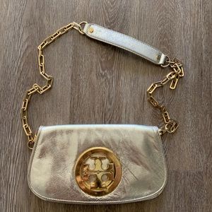 Tory Burch gold clutch with chain and dust bag